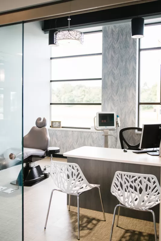 interior-impressions-horton-orthodontics-woodbury-mn-dentist-office-dental-chair-desk-blue-design-wallpaper-windows